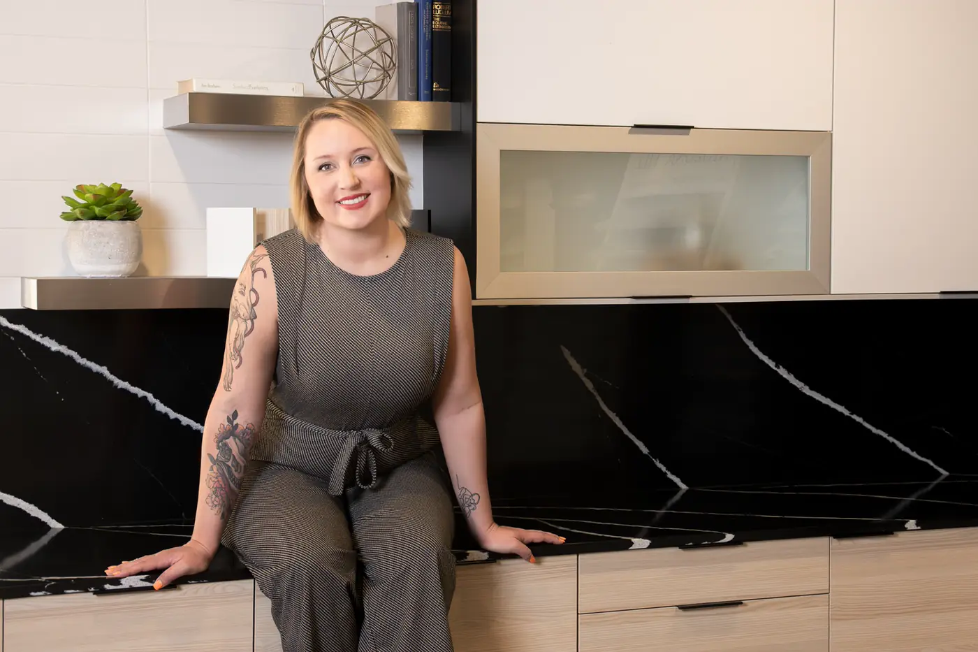 Savannah Hargett, owner of Monet Interior Closets and Cabinets, in a cabinet showroom